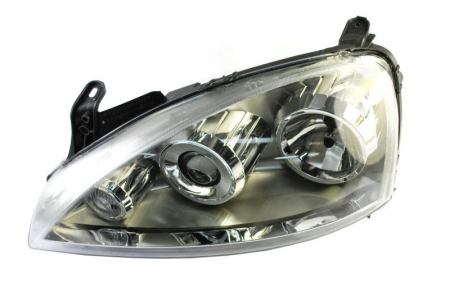 Far stanga (H7, reglaj electric, fundal cromat) OPEL COMBO, CORSA 2003-2010