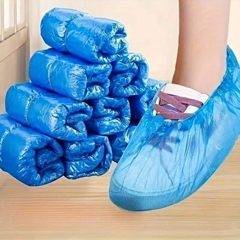 Produse Curatenie & Intretinere - Set de 100 de huse de pantofi din PVC, impermeabile, antiderapante, pentru protectie impotriva murdariei la calatorii, hoteluri, etc.