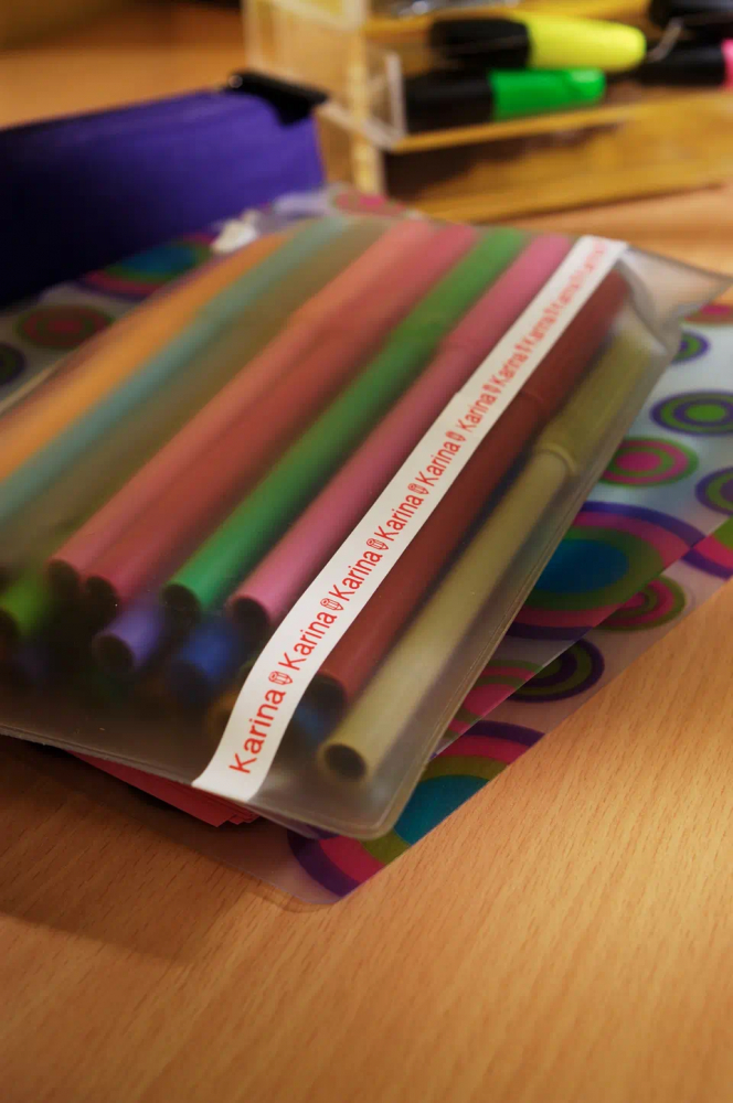 Banda Etichete Brother TZe22, Laminată, Rosu pe Alb, 9mm/8m [4]