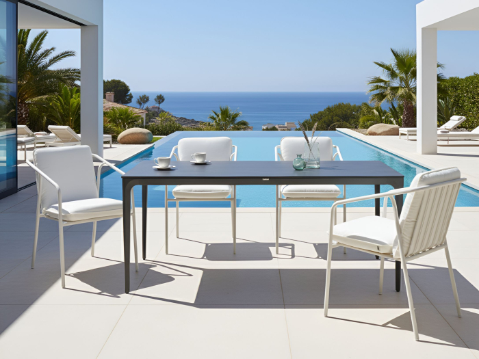 Outdoor dining table SOVARETO 180 cm 90 cm stone effect Dark grey [1]