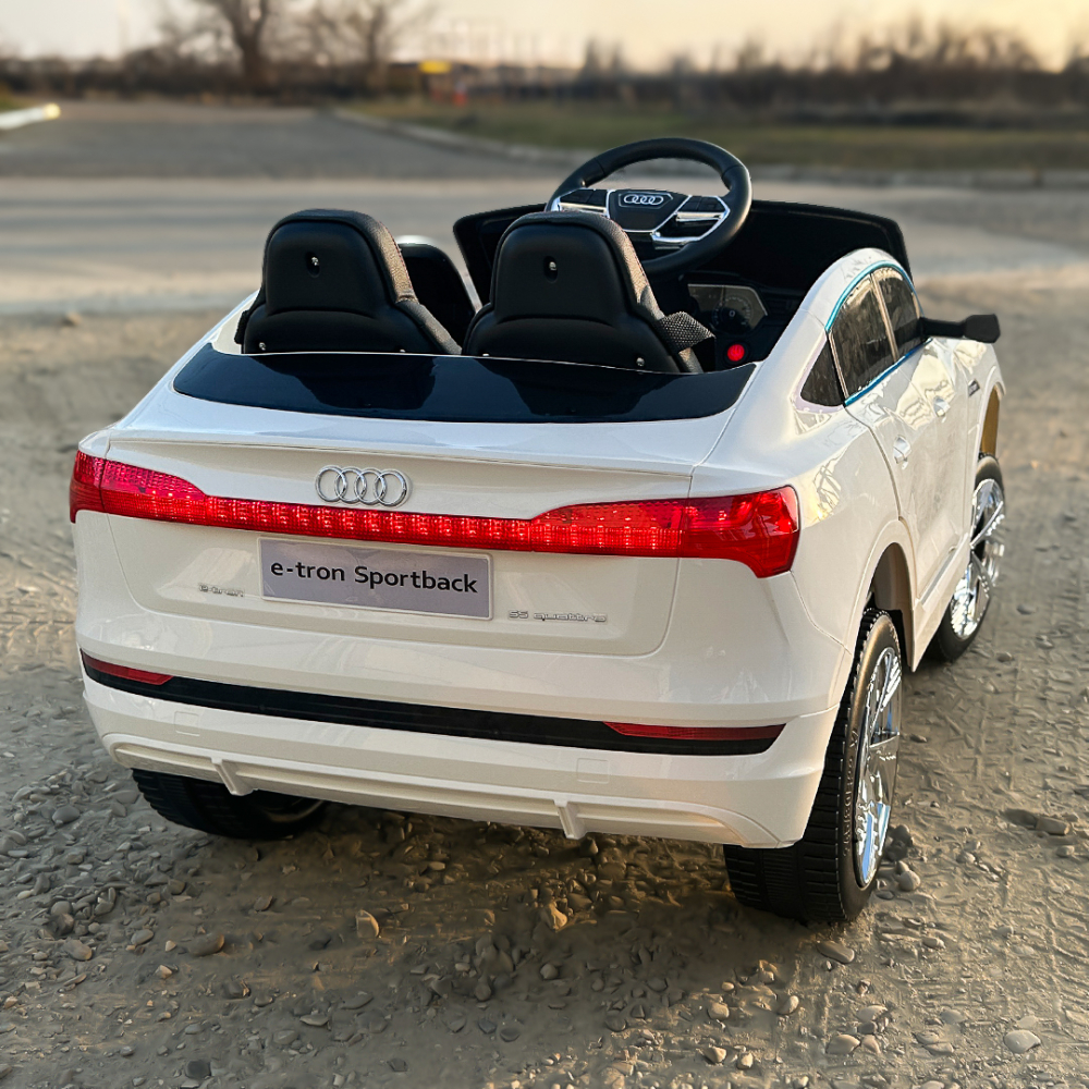 Electric licensed ride-on car for children Audi E-tron Sportback, leather seat & EVA wheels, white [7]