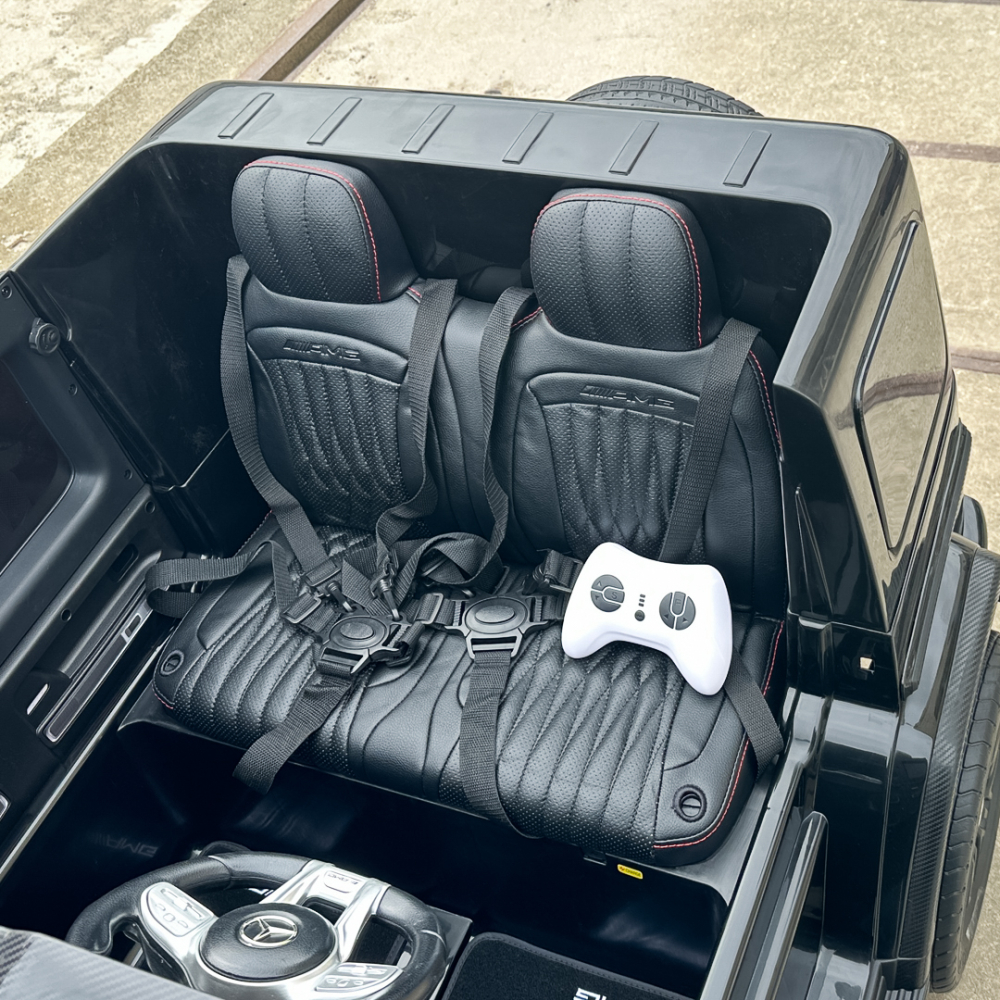 Masinuta electrica Mercedes G63, cu 2 locuri, 4x4, 800W, 24V 14Ah, MP4, neagra [18]