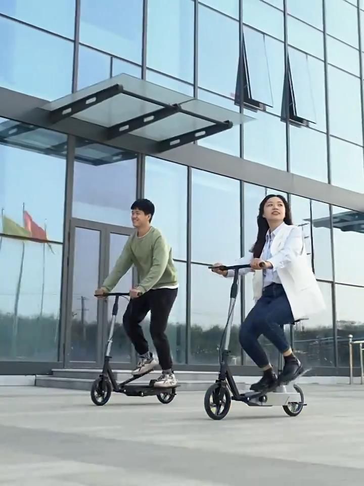 Dual action folding Pegasus scooter with pedals, shock absorption and braking system, rubber wheels, non-electric, gray [4]