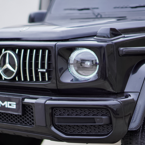 Masinuta electrica Mercedes G63, cu 2 locuri, 4x4, 800W, 24V 14Ah, MP4, neagra [10]