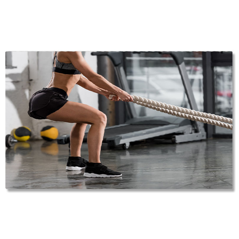 Sport - Tablou Canvas cu Piciorul unei Sportive - Sala de Fitness, Putere, Femeie 40x25CM