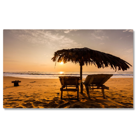 Tablouri Canvas - Tablou Canvas: Atmosfera de seara pe plaja, cu sezlonguri ce se decupeaza pe fundalul apusului 40x25CM