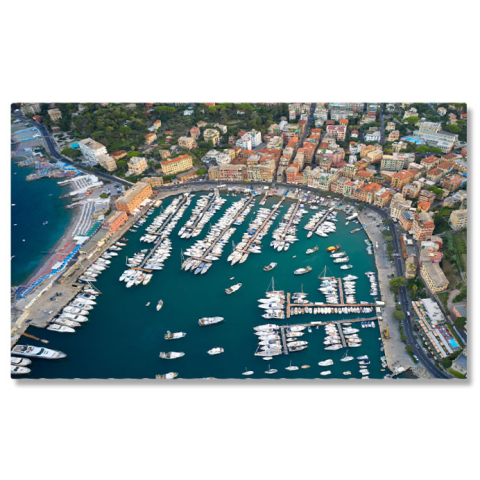 Peisaje cu Drona - Tablou Canvas Privire de sus asupra unui port cu nave maritime ancorate si iahturi, o imagine pitoreasca ce reda atmosfera marina si agitata a portului Ligurian. 40x25CM