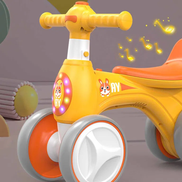 Bicicleta fara Pedale Ride-On Balance Bike pentru Copii  cu 4 Roti Silentioase, Muzica , Lumini si Baloane de Sapun -  Galben Multicolor [1]