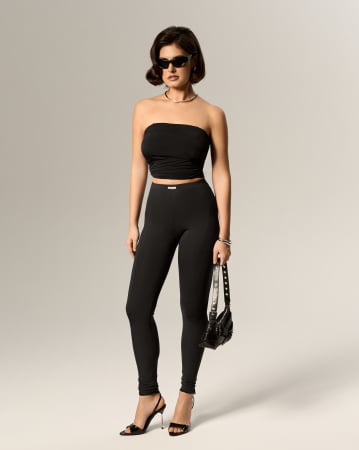 PANTALONI - Colanți cu cusături decorative, negri.