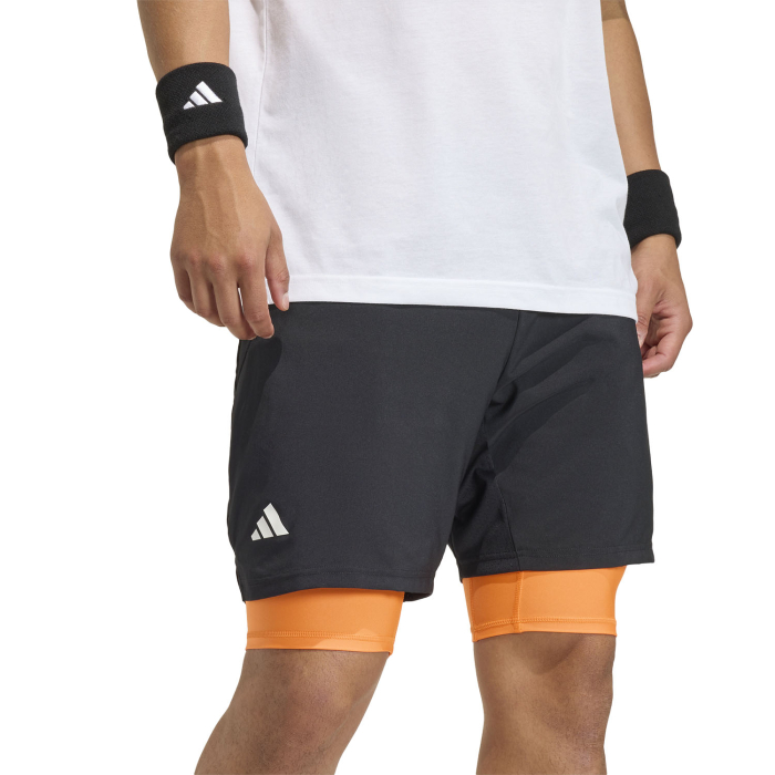 Short Adidas Barbati Club 2in1 Black/Orange este un short tehnic 2 in 1 cu inner shorts integrat, CLIMACOOL, talie elastica cu snur si croiala slim fit, perfect pentru tenis si antrenamente. [3]