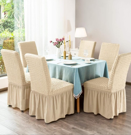Huse Scaune - huse-scaune-cu-fusta huse-scaune-elegante huse-scaune-dining-crem huse-scaune-set-6-crem  ALT TEXT  Huse elastice pentru scaune cu fustă decorativă culoare crem set 6 bucăți.