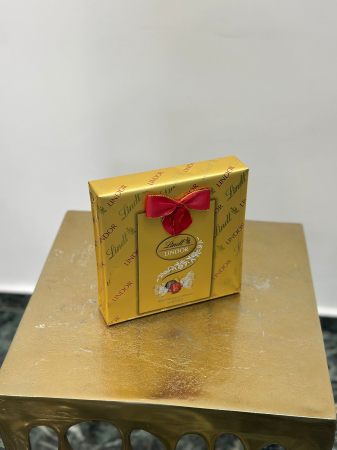 Bomboane de ciocolata - Bomboane de ciocolata cu lapte asortate cu umplutra fina  Bomboane de ciocolata cu lapte asortate cu umplutra fina