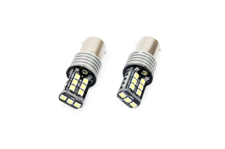 Auto - Moto - Set becuri auto cu LED CANBUS compatibil P21W BA15S 15 SMD 7.5W Alb 12/24V, destinat competitiilor auto sau off-road