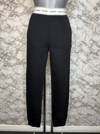 PANTALONI ELEGANȚI - Pantaloni Trening Guess Damă – Lungi, Casual- logo distinctiv, colecție outlet.