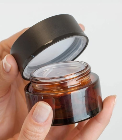 Materiale  - Borcan sticlă Laurence Amber cu capac și disc, 50 ml
