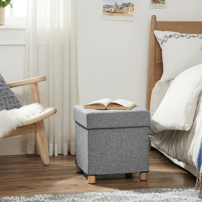 Taburet cu spatiu de depozitare 37 L, pliabil, sezut captusit, picioare din lemn, capacitate 300 kg, 38x38x40 cm, gri deschis [6]