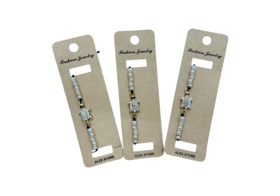 Haine si accesorii Engros - Bratara cu perle albe si pandantiv broscuta cu cristale – accesoriu elegant si simbolic pentru femei si fete, 