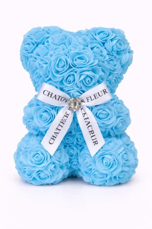 Aranjamente florale - Urs din trandafiri artificiali albastru deschis din spuma , in cutie transparenta