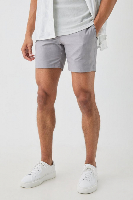 PANTALONI SCURȚI ELASTICI CU TALIE FIXĂ, CROIȚI SLIM FIT [1]