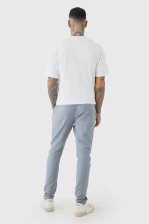 Pantaloni jogger interlock înalți, cu tiv despicat, flambați [1]