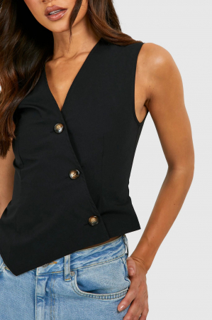 Vestă înaltă țesută cu nasturi asimetrici [1]