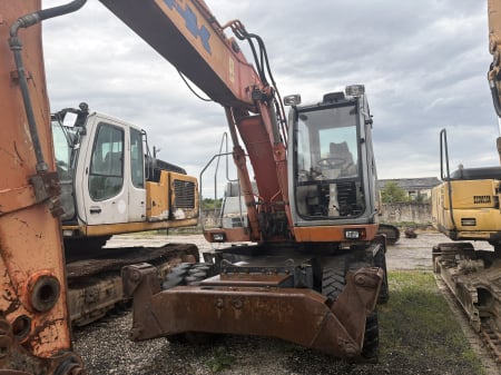 Excavatoare pe Roții - excavator-roti-fiat-kobelco-e175w-motor-cummins-dezmembrari