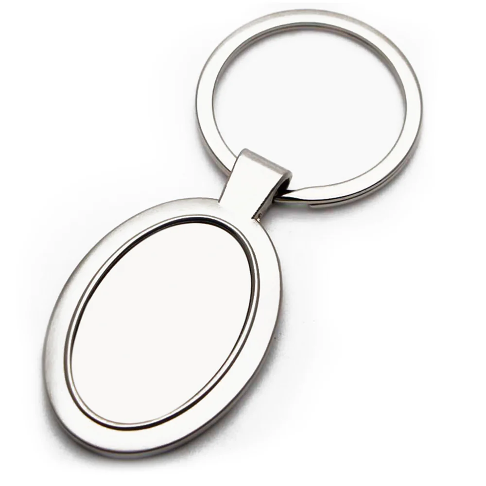 Cadouri personalizate - Breloc metalic oval cu poza ta