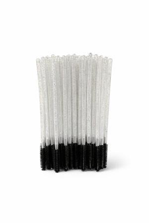 Set de periuțe colorate din silicon pentru gene, cu mâner negru și capăt flexibil în nuanțe de roz și mov, dispuse în evantai pe o suprafață albă. [2]