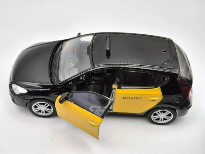 Macheta Hyundai i30 Taxi Barcelona Galben cu Negru – Welly 1:38 [2]
