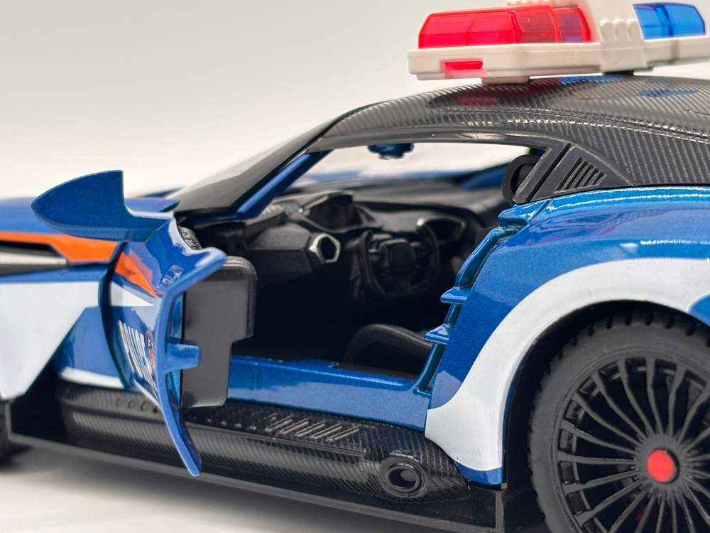 Automachetă Aston Martin Valkyrie Poliție, din Metal, 1:24, 20 cm, Funcție Pull-Back, Elemente Mobile, Sunete și Lumini [7]