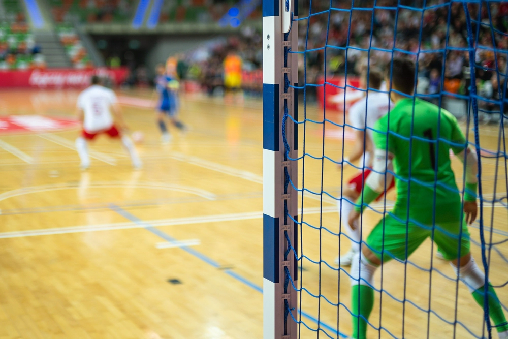 Imagine cu un joc de futsal