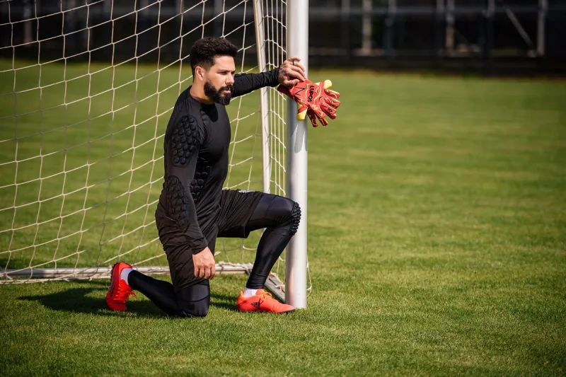 soccer goalkeeper near the goal