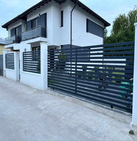 Porți și Garduri - Poartă și gard metalic – Design modern și rezistență maximă