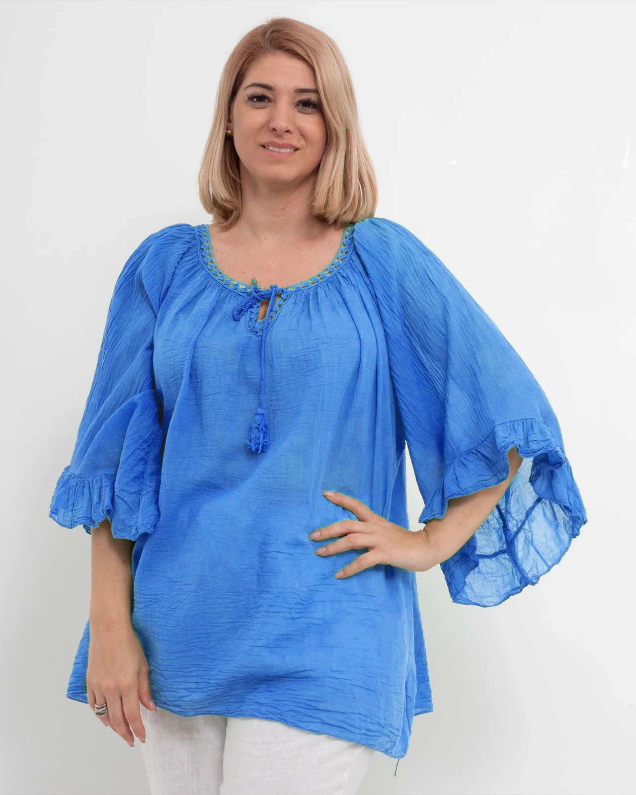 Bluză tip ie albastră oversize cu ciucuri și volane [1]