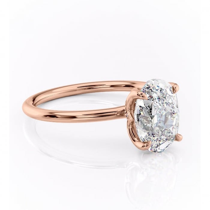 Inel de logodnă Zephyra din aur Rose 14kt cu moissanite tăietură ovală – Solitar rafinată pentru profil înalt | Personalizează și configurează gratuit online [1]