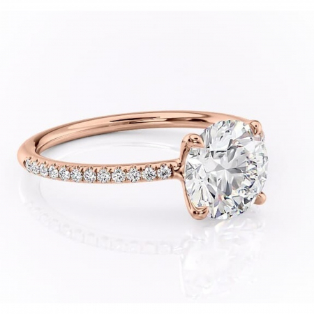 Aur roz - Inel de logodnă Adelaide din aur Rose 14kt cu moissanite tăietură rotundă – Montură pavé rafinată pentru profil jos | Personalizează și configurează gratuit online