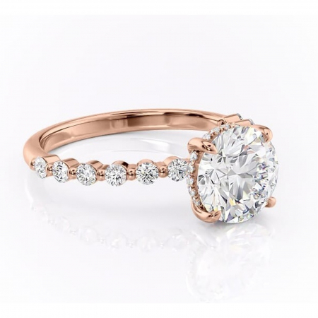 Aur roz - Inel de logodnă Amara din aur Rose 14kt cu moissanite tăietură rotundă – Pietre laterale rafinată pentru profil înalt | Personalizează și configurează gratuit online