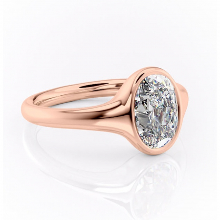 Aur roz - Inel de logodnă Avenelle din aur Rose 18kt cu moissanite tăietură ovală – Montură închisă rafinată pentru solitar | Personalizează și configurează gratuit online