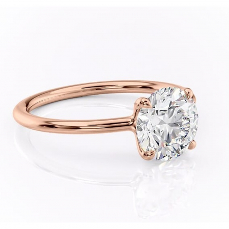 Aur roz - Inel de logodnă Helena din aur Rose 14kt cu moissanite tăietură rotundă – Solitar rafinată pentru profil jos | Personalizează și configurează gratuit online
