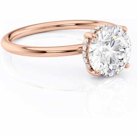 Aur roz - Inel de logodnă Nyla din aur Rose 14kt cu moissanite tăietură rotundă – Montură Kamellie joasă rafinată pentru profil jos | Personalizează și configurează gratuit online