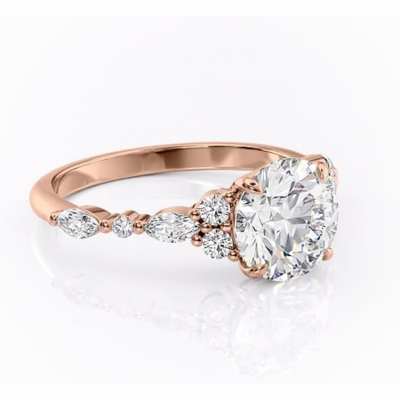 Aur roz - Inel de logodnă Rosamund din aur Rose 14kt cu moissanite tăietură rotundă – Pietre laterale rafinată pentru profil mediu | Personalizează și configurează gratuit online