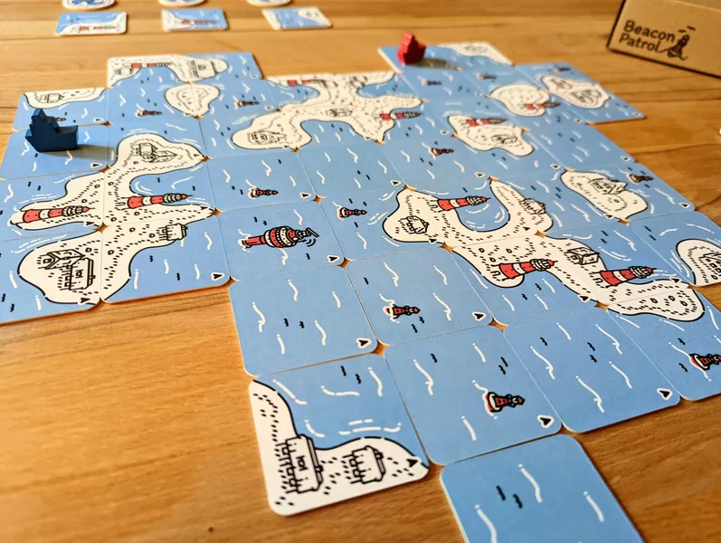 Beacon Patrol joc cooperativ tile placement Marea Nordului faruri Pandasaurus [4]