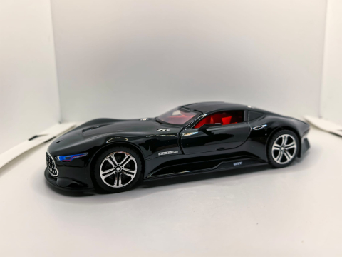 Mașini de colecție - Machetă metalică de colecție Mercedes-Benz AMG Vision Gran Turismo de culoare neagră lucios, cu design aerodinamic.