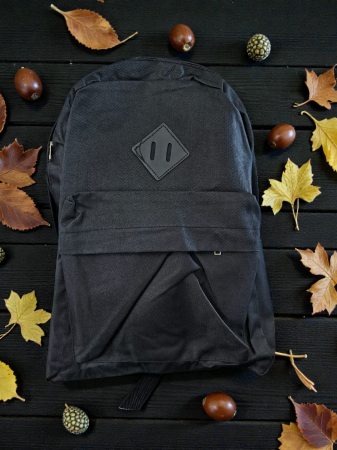 Ghiozdane și Rucsacuri - Ghiozdan școlar colorat din nylon și poliester cu bretele buretate și buzunar lateral.