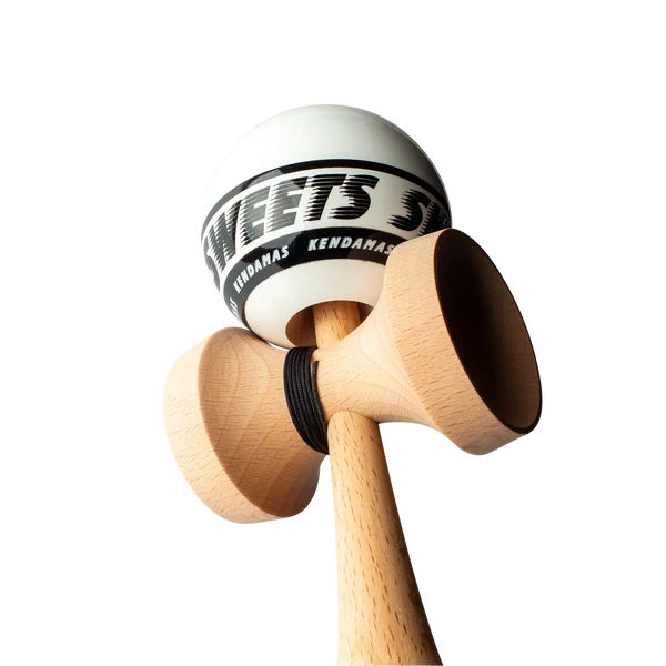 Cumpara Sweets Kendama Starter - White Sweets <p data-end="107" data-start="48"><strong data-end="107" data-start="48">CEA MAI BUNĂ KENDAMA PENTRU ÎNCEPĂTORI – SWEETS STARTER</strong></p><p data-end="543" data-start="109">Când am conceput noua noastră kendama de început, am avut în vedere mai multe aspecte importante: să fie accesibilă ca preț, să ofere o experiență de joc plăcută și să faciliteze învățarea trucurilor, oferind totodată o cale ușoară de a descoperi kendama și de a te alătura comunității noastre în creștere. Credem că am atins toate aceste obiective și abia așteptăm ca jucători, atât noi cât și avansați, să încerce kendamele Starter!</p><hr data-end="548" data-start="545" /><p data-end="568" data-start="550"><strong data-end="568" data-start="550">Caracteristici</strong></p><p data-end="577" data-start="570"><strong data-end="577" data-start="570">KEN</strong></p><ul data-end="677" data-start="578"> <li data-end="593" data-start="578"> <p data-end="593" data-start="580">Formă Amped</p> </li> <li data-end="609" data-start="594"> <p data-end="609" data-start="596">Lemn de fag</p> </li> <li data-end="645" data-start="610"> <p data-end="645" data-start="612"><em data-end="627" data-start="612">Balance Bevel</em> în cupa de bază</p> </li> <li data-end="677" data-start="646"> <p data-end="677" data-start="648">Logo gravat <em data-end="677" data-start="660">Sweets Crossken</em></p> </li></ul><p data-end="687" data-start="679"><strong data-end="687" data-start="679">TAMA</strong></p><ul data-end="796" data-start="688"> <li data-end="697" data-start="688"> <p data-end="697" data-start="690">62 mm</p> </li> <li data-end="713" data-start="698"> <p data-end="713" data-start="700">Lemn de fag</p> </li> <li data-end="738" data-start="714"> <p data-end="738" data-start="716">6 opțiuni de culoare</p> </li> <li data-end="769" data-start="739"> <p data-end="769" data-start="741">Urmărire vizuală excelentă</p> </li> <li data-end="796" data-start="770"> <p data-end="796" data-start="772">Acoperire <em data-end="796" data-start="782">Sticky Clear</em></p> </li></ul><p data-end="809" data-start="798"><strong data-end="809" data-start="798">INCLUDE</strong></p><ul data-end="868" data-start="810"> <li data-end="838" data-start="810"> <p data-end="838" data-start="812">Mărgea metalică rotativă</p> </li> <li data-end="857" data-start="839"> <p data-end="857" data-start="841">Ață de rezervă</p> </li> <li data-end="868" data-start="858"> <p data-end="868" data-start="860">Stickere</p> </li></ul>. Kendama originala din lemn, ideala pentru freestyle, antrenament si competitie. Potrivita pentru incepatori si avansati. [7]