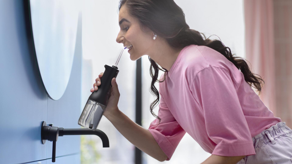 Irigator bucal PHILIPS Sonicare Cordless Power Flosser 3000 HX3826/33, Tehnologie QuadStream, Portabil, 2 moduri de curatare, 3 niveluri de intensitate, 2 x capete de curatare si 1 x husa transport, N [5]
