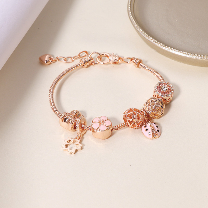 Bratara de dama cu charmuri, model floral, buburuza, placata cu aur 18K, marime reglabila 17cm+4, pietre zirconiu, rose gold [2]