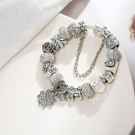 Bratara de dama cu 18 charm-uri, model in forma de trifoi cu pietre zirconiu, placat cu argint, inchidere clips, marime 18 cm, Tessero, argintiu [1]