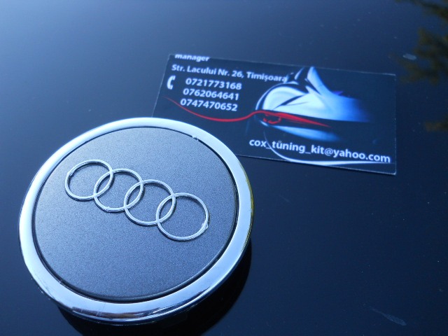 capace originale audi pe fundal gri sobolan [3]