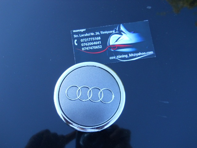 capace originale audi pe fundal gri sobolan [2]